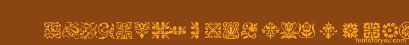 Ptornament Font – Orange Fonts on Brown Background