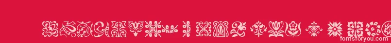 Ptornament-fontti – vaaleanpunaiset fontit punaisella taustalla