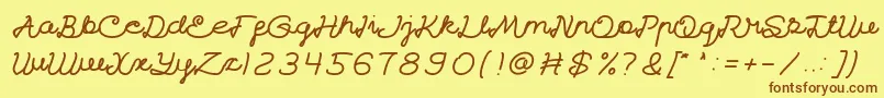 フォントCatatanHarian – 茶色の文字が黄色の背景にあります。