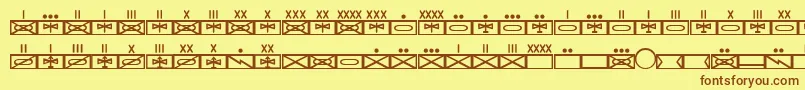 フォントEsriMilmod01 – 茶色の文字が黄色の背景にあります。