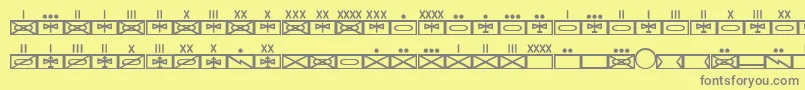 フォントEsriMilmod01 – 黄色の背景に灰色の文字