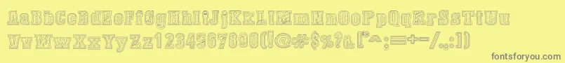 DustWestCollege-Schriftart – Graue Schriften auf gelbem Hintergrund