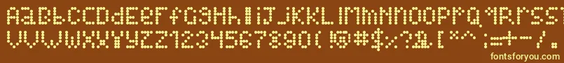 Alienss Font – Yellow Fonts on Brown Background