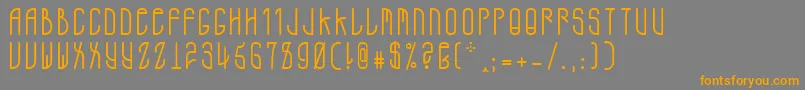 フォントADMono – オレンジの文字は灰色の背景にあります。