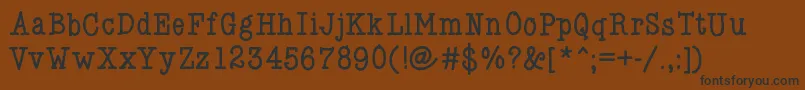 フォントKlgabe – 黒い文字が茶色の背景にあります