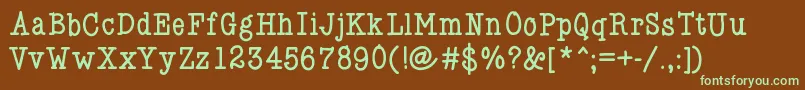 フォントKlgabe – 緑色の文字が茶色の背景にあります。