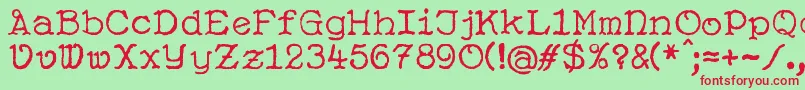 SusanneNouveau-Schriftart – Rote Schriften auf grünem Hintergrund