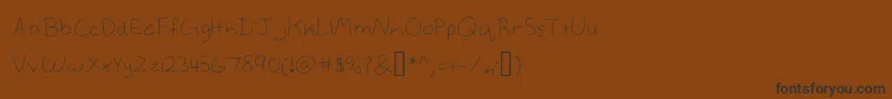 Annekelight-Schriftart – Schwarze Schriften auf braunem Hintergrund