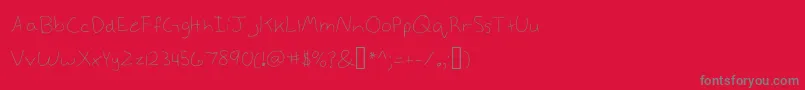 フォントAnnekelight – 赤い背景に灰色の文字