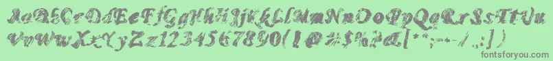 Monomadness Font – Gray Fonts on Green Background