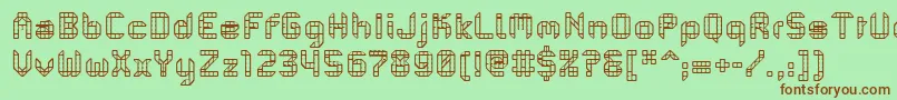 PfMechanicaBProComb-fontti – ruskeat fontit vihreällä taustalla