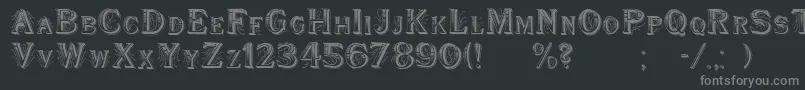 フォントWoodenShipDecorated – 黒い背景に灰色の文字