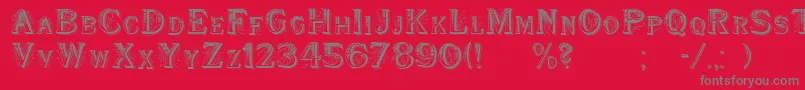 WoodenShipDecorated-fontti – harmaat kirjasimet punaisella taustalla