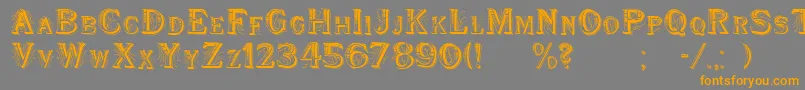 フォントWoodenShipDecorated – オレンジの文字は灰色の背景にあります。