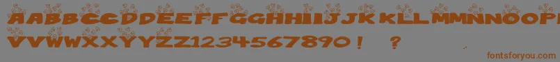 Popcorn-Schriftart – Braune Schriften auf grauem Hintergrund
