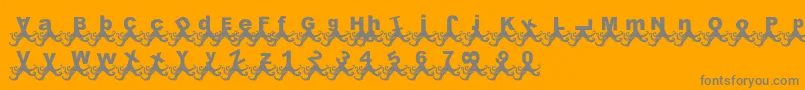 PaulPulpo-Schriftart – Graue Schriften auf orangefarbenem Hintergrund