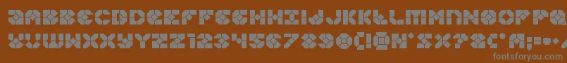 Zoomrunner-fontti – harmaat kirjasimet ruskealla taustalla