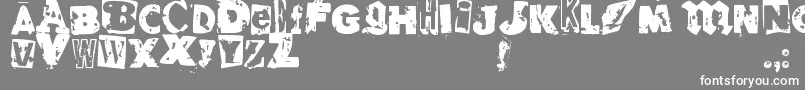 フォントRvdGlued – 灰色の背景に白い文字