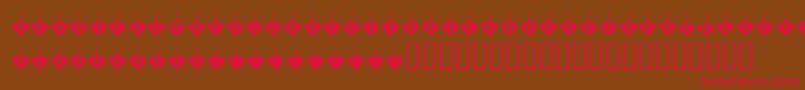 フォントKrBurningLove – 赤い文字が茶色の背景にあります。