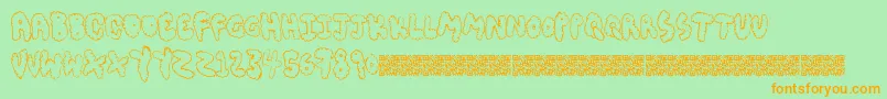 フォントChubbymuffin – オレンジの文字が緑の背景にあります。