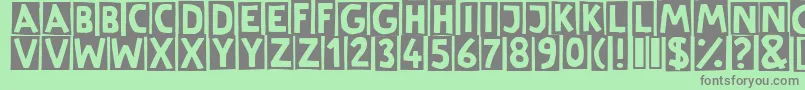 LinotypeCutter Font – Gray Fonts on Green Background