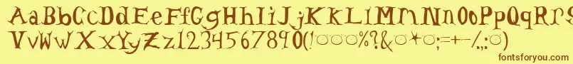 フォントHeadache – 茶色の文字が黄色の背景にあります。