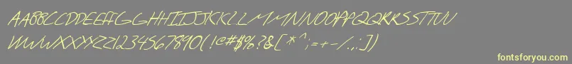 SfScribbledSansScItalic-fontti – keltaiset fontit harmaalla taustalla