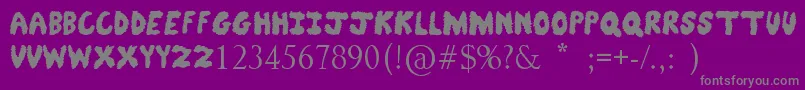 FuzzyBear-fontti – harmaat kirjasimet violetilla taustalla