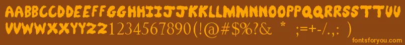 FuzzyBear Font – Orange Fonts on Brown Background
