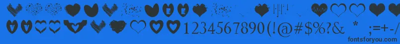 SexyLoveHearts-Schriftart – Schwarze Schriften auf blauem Hintergrund