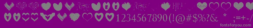 フォントSexyLoveHearts – 紫の背景に灰色の文字