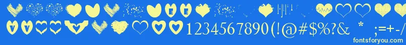 SexyLoveHearts Font – Yellow Fonts on Blue Background