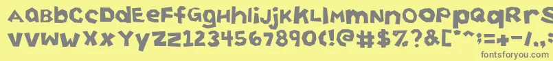 CuttingCorners-fontti – harmaat kirjasimet keltaisella taustalla
