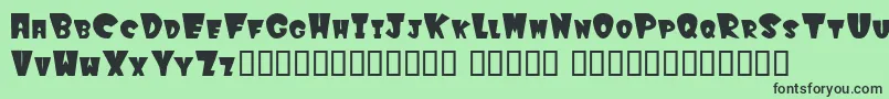フォントWinksfilled – 緑の背景に黒い文字
