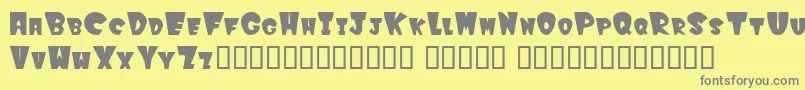 Winksfilled Font – Gray Fonts on Yellow Background