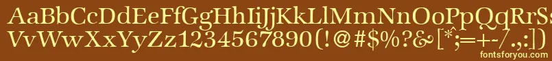 ZabriskieinternationalRegular Font – Yellow Fonts on Brown Background