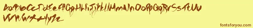 フォントGothicscribble – 茶色の文字が黄色の背景にあります。