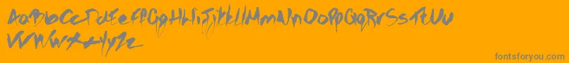 Gothicscribble-Schriftart – Graue Schriften auf orangefarbenem Hintergrund