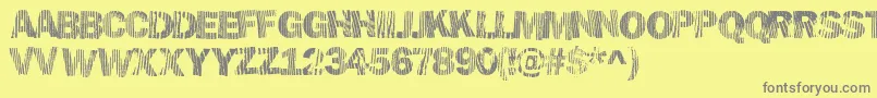 Hellawood Font – Gray Fonts on Yellow Background