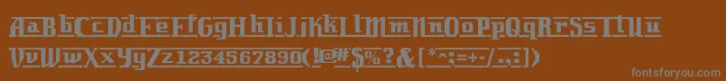 フォントLambrettista – 茶色の背景に灰色の文字