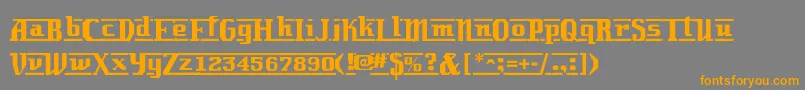 フォントLambrettista – オレンジの文字は灰色の背景にあります。