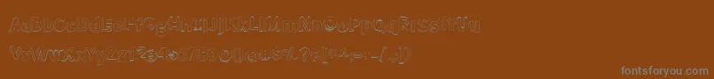 Шрифт BmdMeatloafShadowOutline – серые шрифты на коричневом фоне