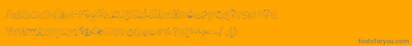 BmdMeatloafShadowOutline-Schriftart – Graue Schriften auf orangefarbenem Hintergrund