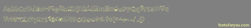 BmdMeatloafShadowOutline-fontti – keltaiset fontit harmaalla taustalla