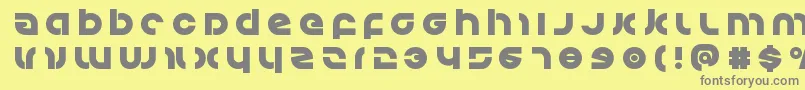 Kovacstitle Font – Gray Fonts on Yellow Background