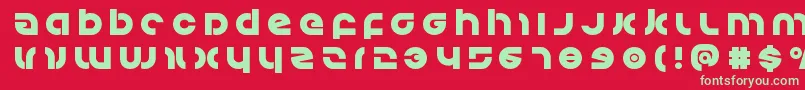 Kovacstitle Font – Green Fonts on Red Background