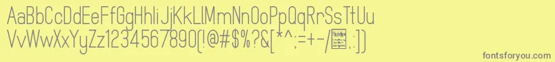 Шрифт MindblueRegularDemo – серые шрифты на жёлтом фоне