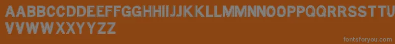 MtfBaseOutline Font – Gray Fonts on Brown Background