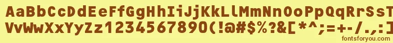 フォントOcrfBoldc – 茶色の文字が黄色の背景にあります。