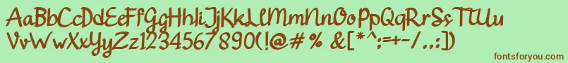 Gendhist Font – Brown Fonts on Green Background